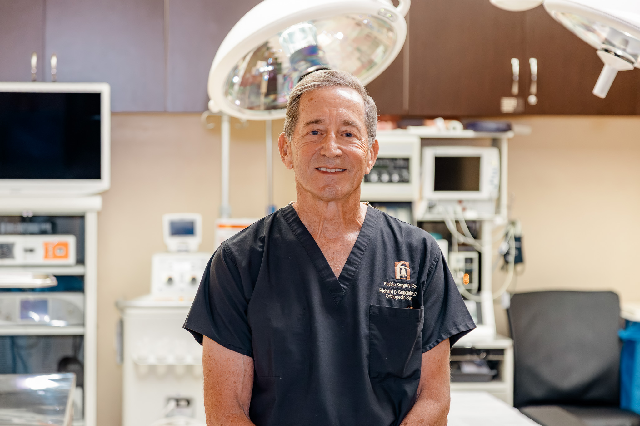 Dr. Richard Scheinberg in the operating room at Pueblo Surgery Center